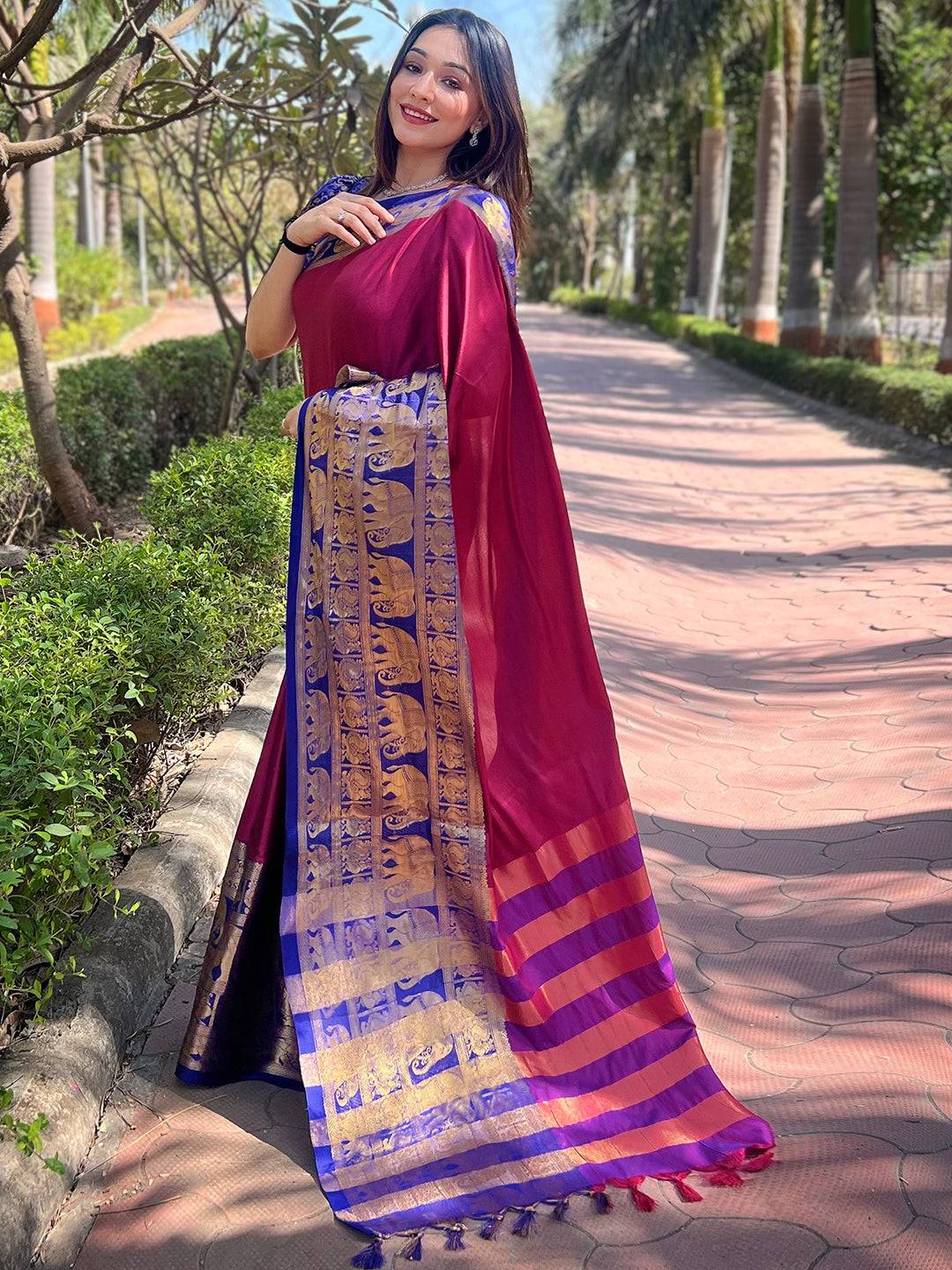 Traditional maroon saree with gold woven patterns