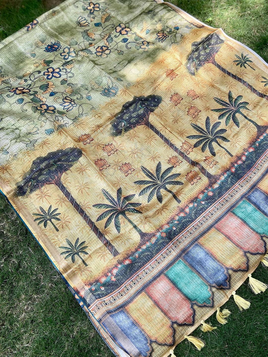 Close-up of light green Kota Doriya silk saree with floral and palm motifs