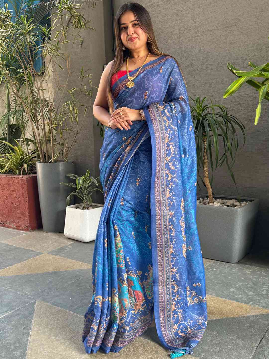 Elegant blue saree with intricate digital print design
