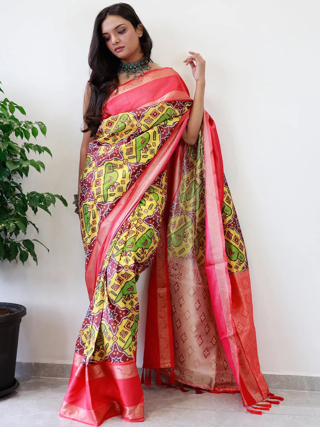 Soft silk saree with Gadwal border and Pochampally print.