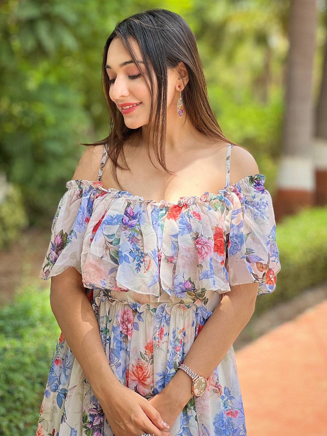 Smiling woman in floral maxi dress