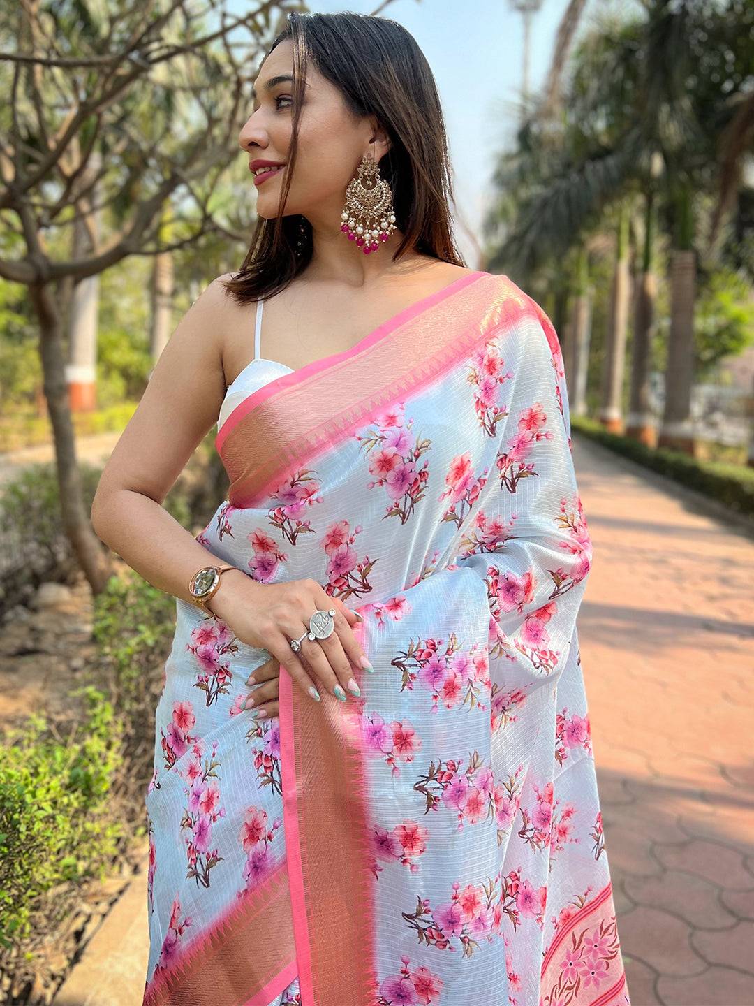 Close-up of light blue Kota saree with digital floral print