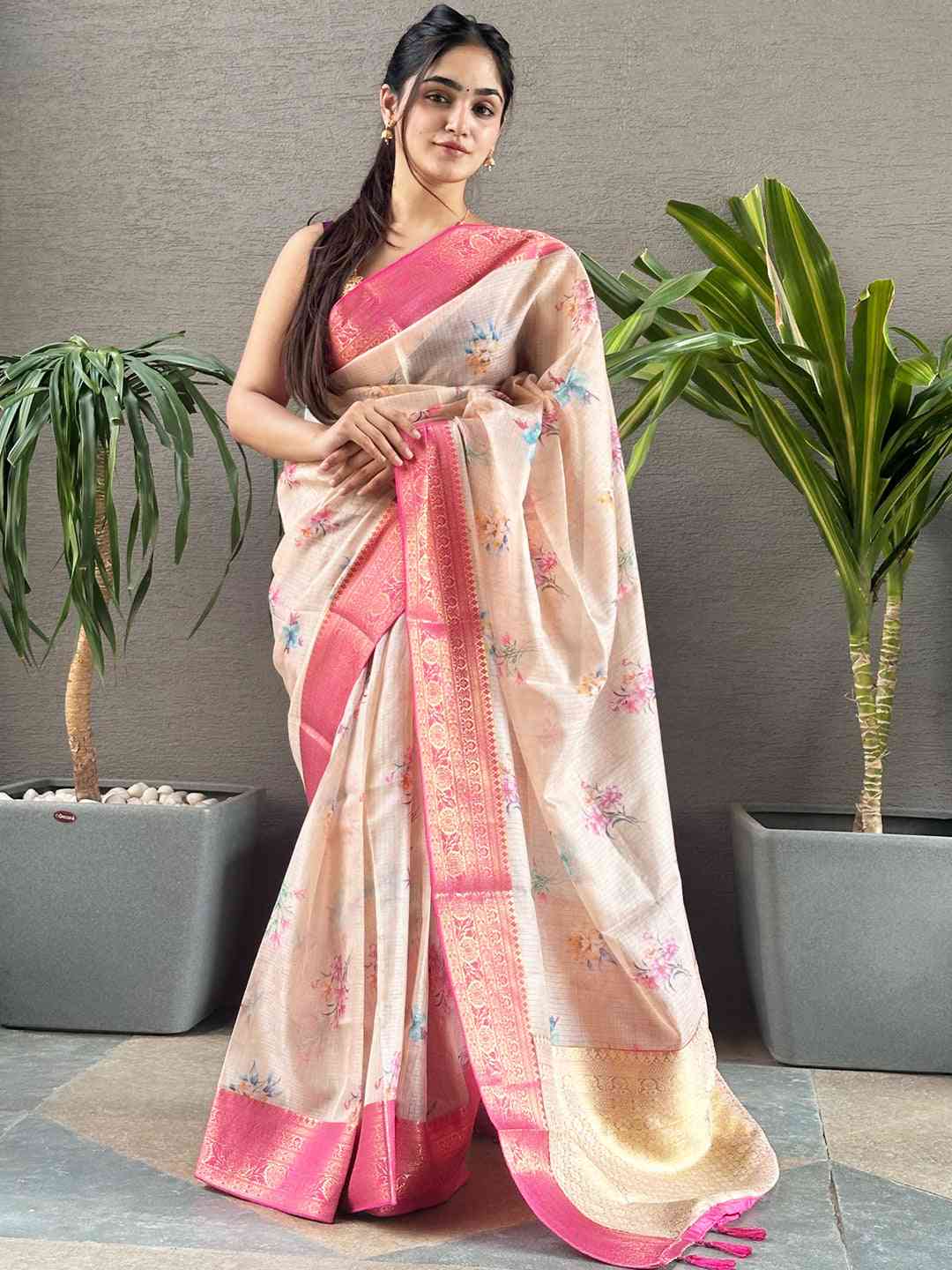 Elegant peach Kota silk saree with floral design and pink accents