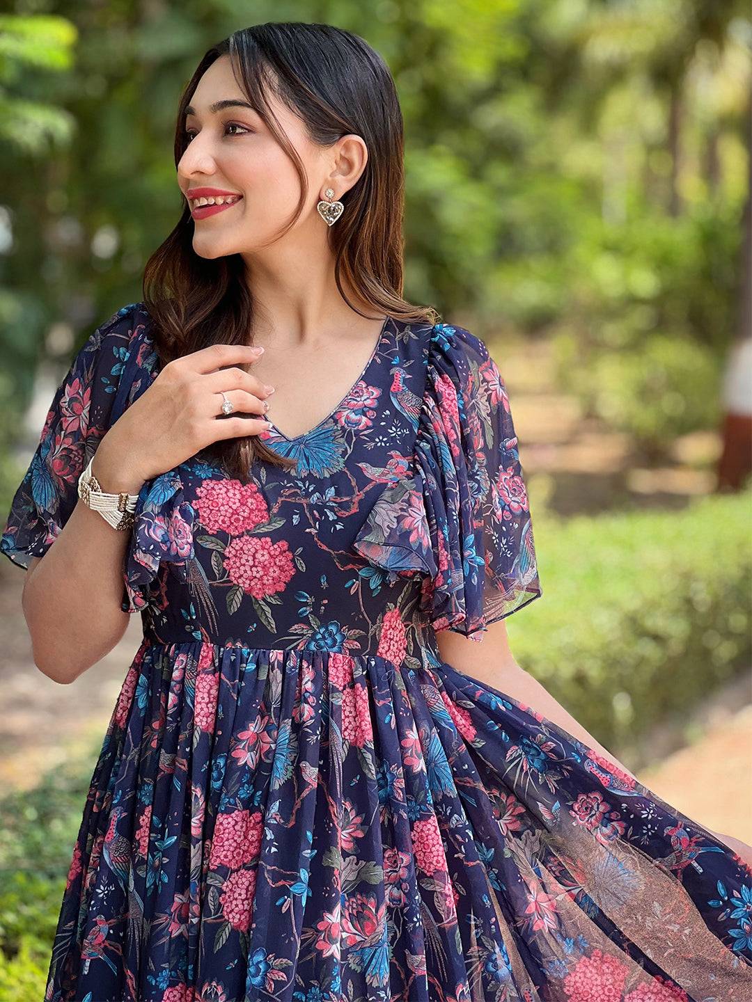 Smiling woman in Midnight Navy Floral V-Neck Dress