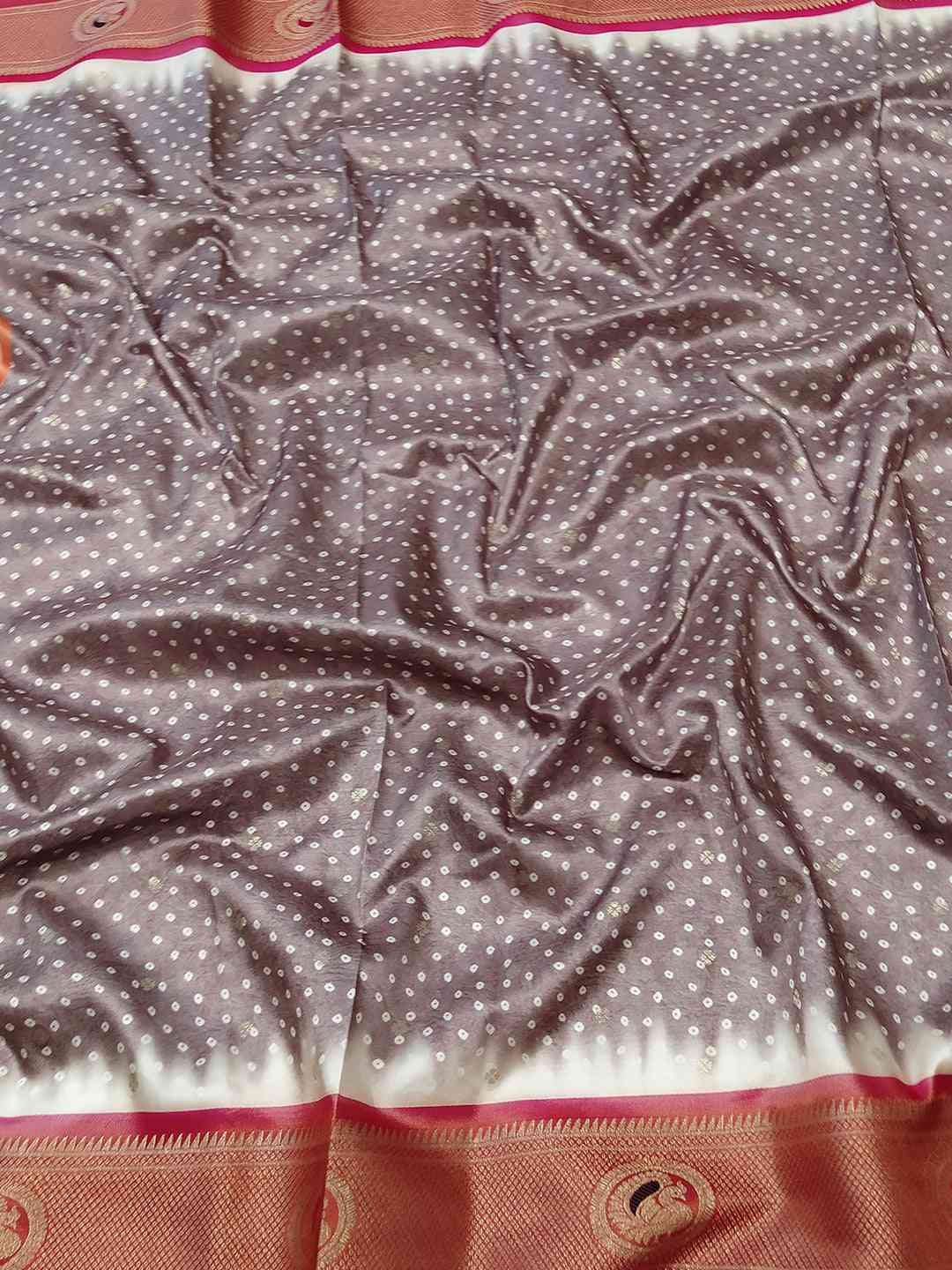 Close-up of Paithani Minakari Pallu Bandhej Print Saree fabric