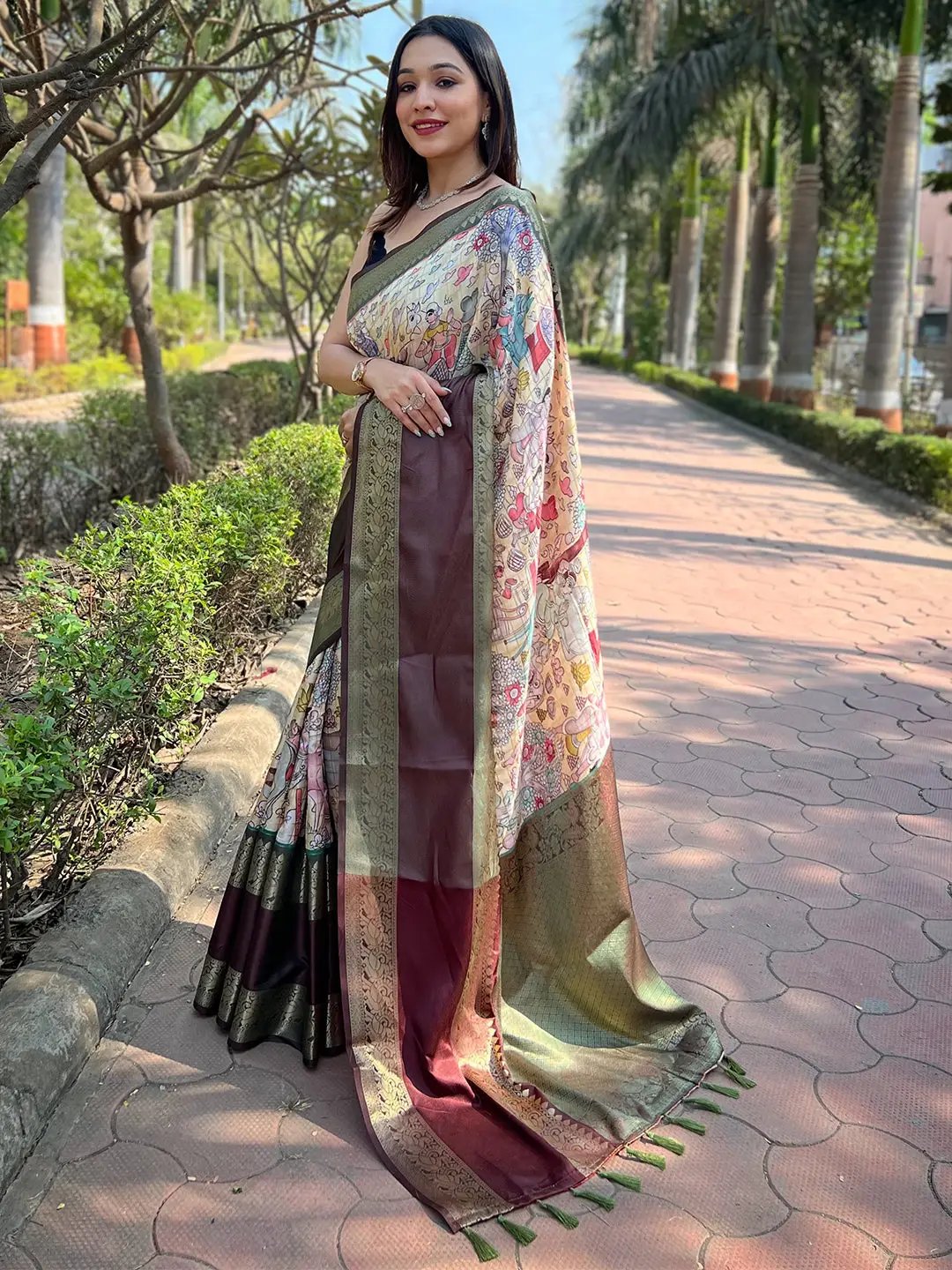 Model posing in light green Banarasi saree with intricate design