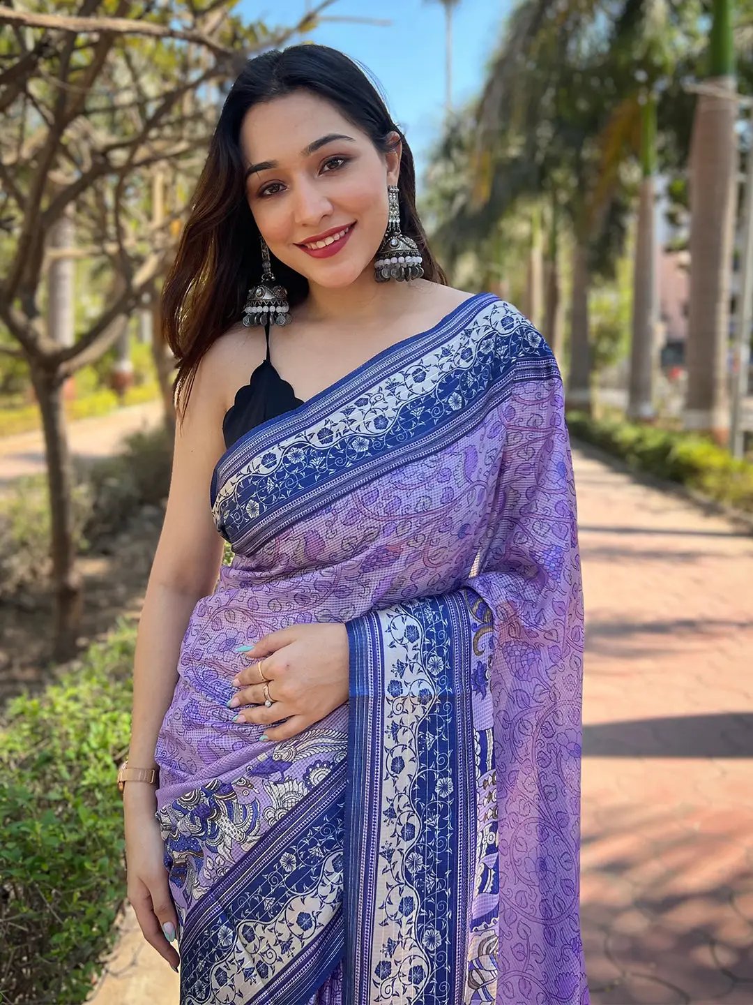 Model wearing Purple Satin Kota Doria Saree with Kalamkari