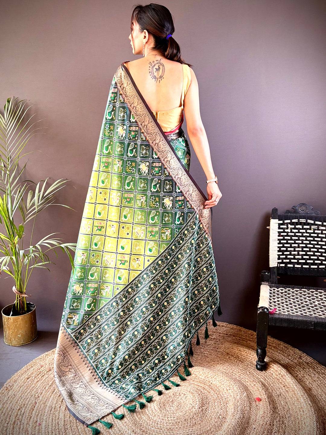 Back view of Ombre Green Soft Silk Patola Print Saree