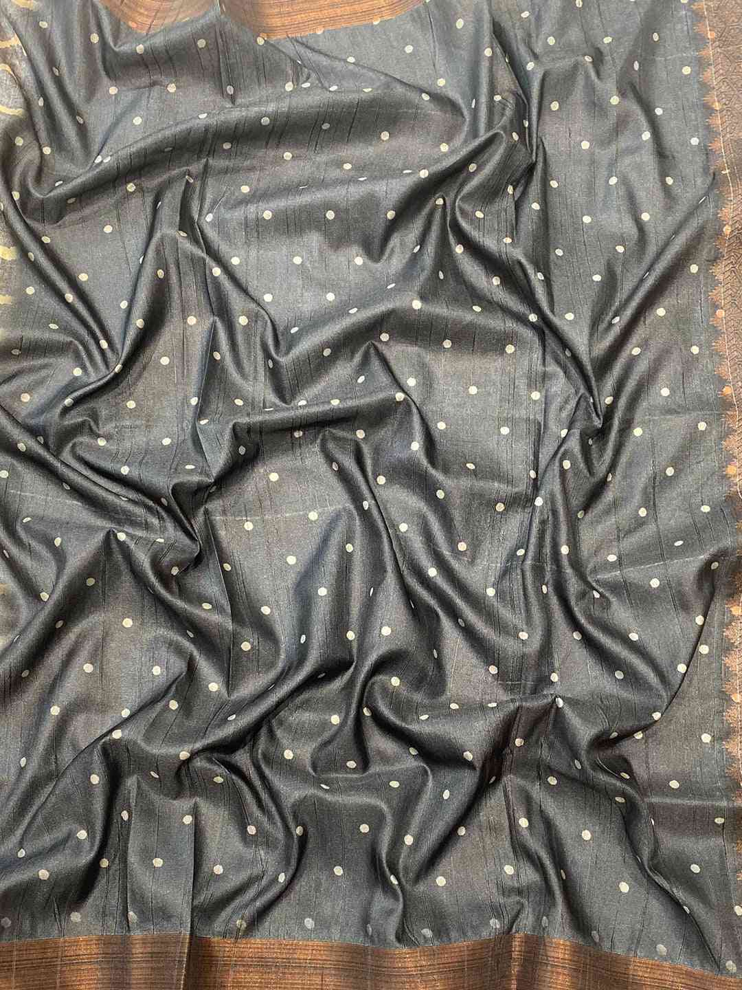 Close-up of Pure Tussar Silk Ghicha Saree fabric with dots