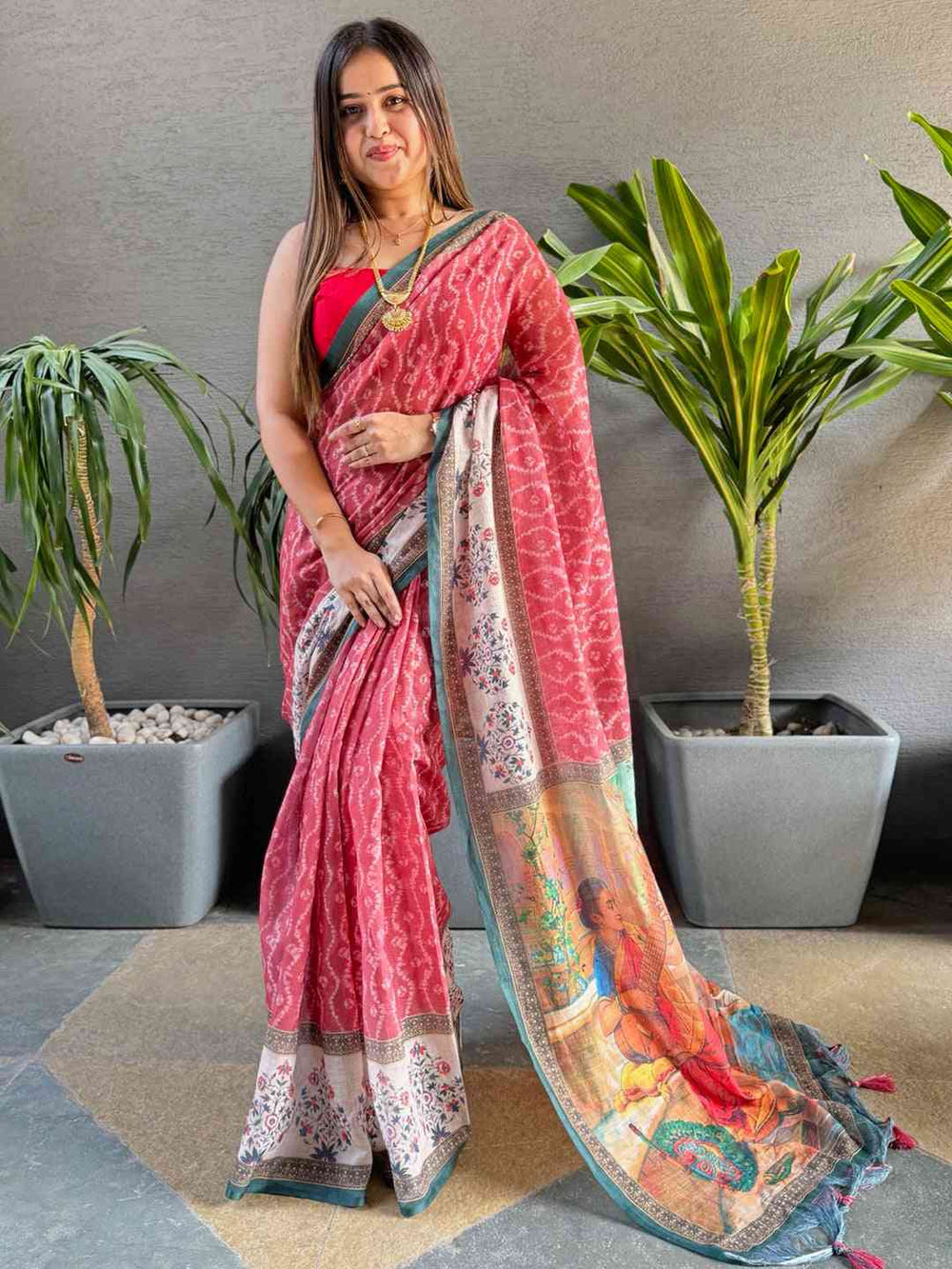 Gajari Ikkat saree with Kalamkari design, model standing