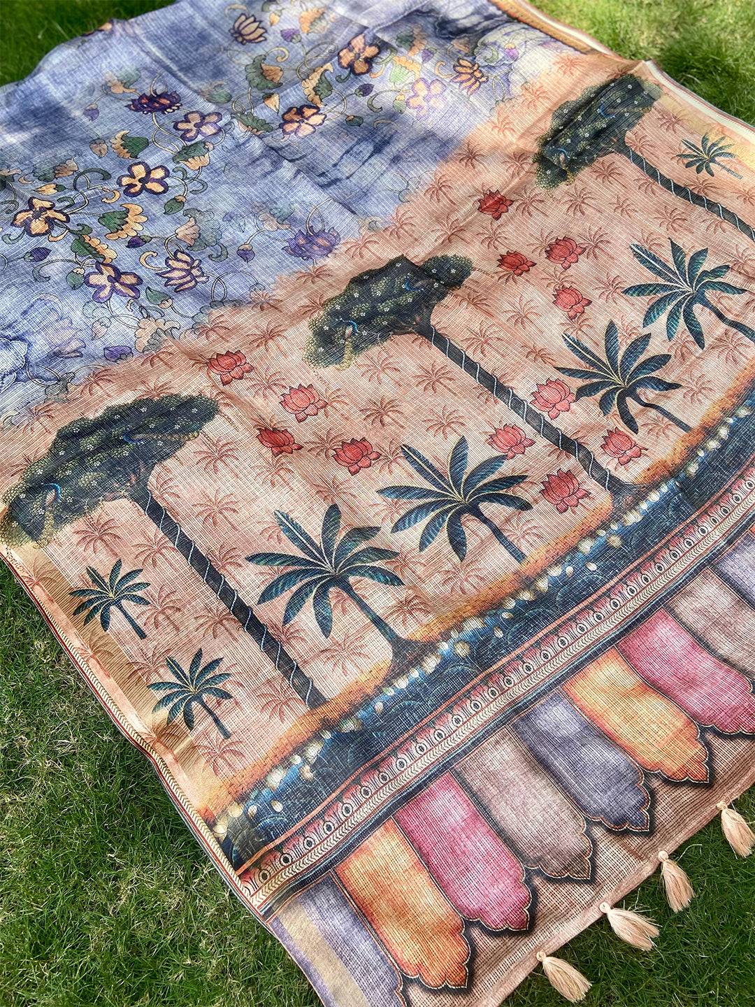 Close-up of blue Kota Doriya silk saree with intricate floral print.