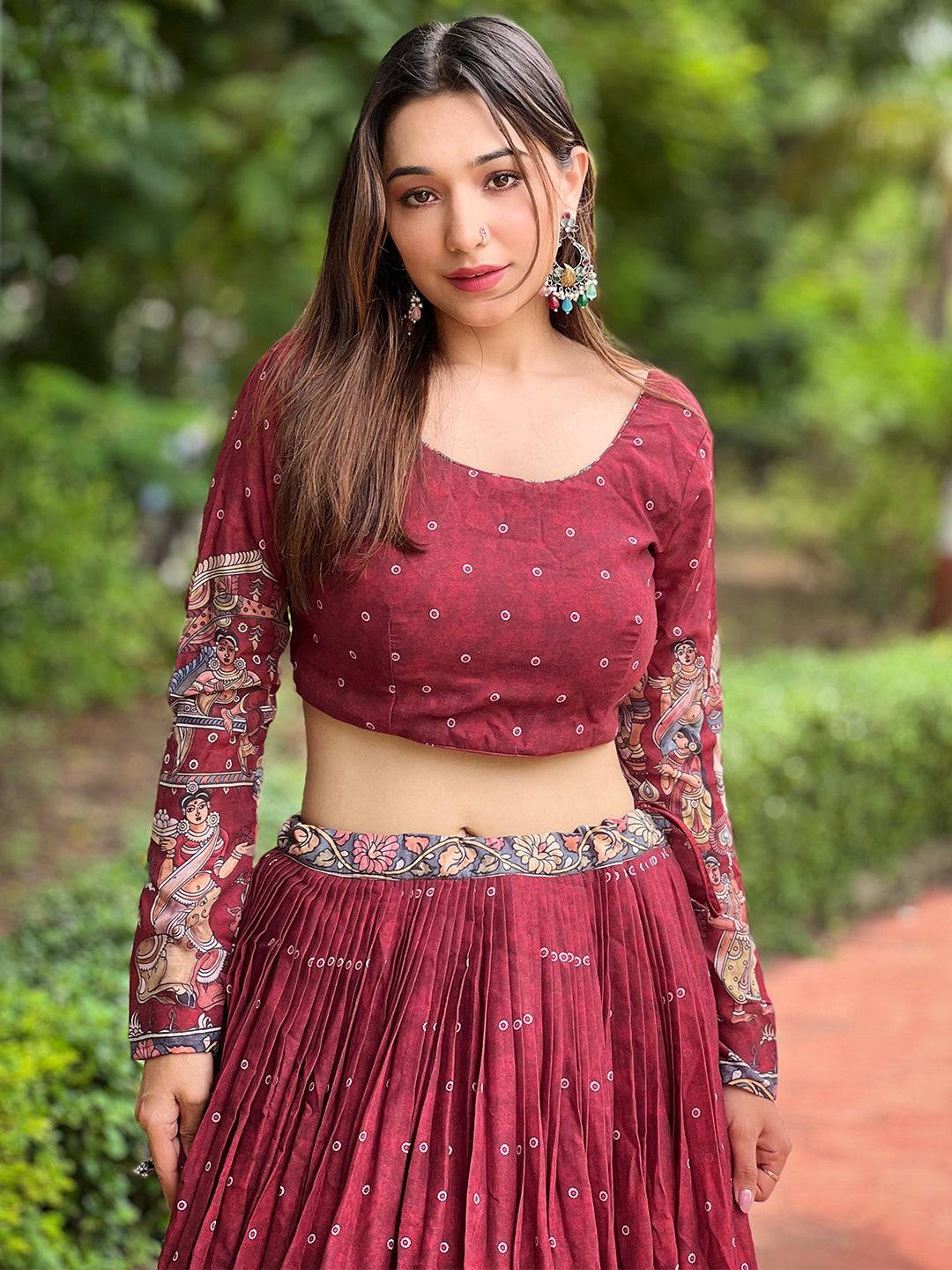 Close-up of deep maroon Kalamkari lehenga set