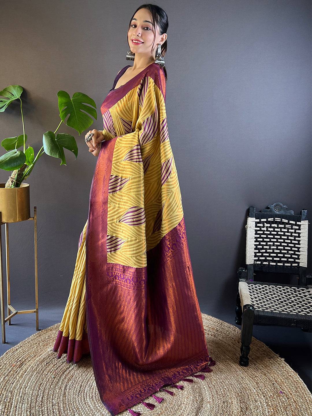 Side pose of Olive Tussar Silk Ikkat Saree with elegant drape