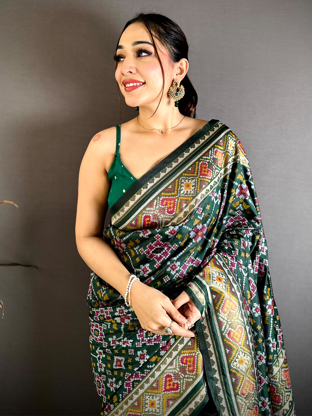 Green Patola Weaving Semi Silk Saree