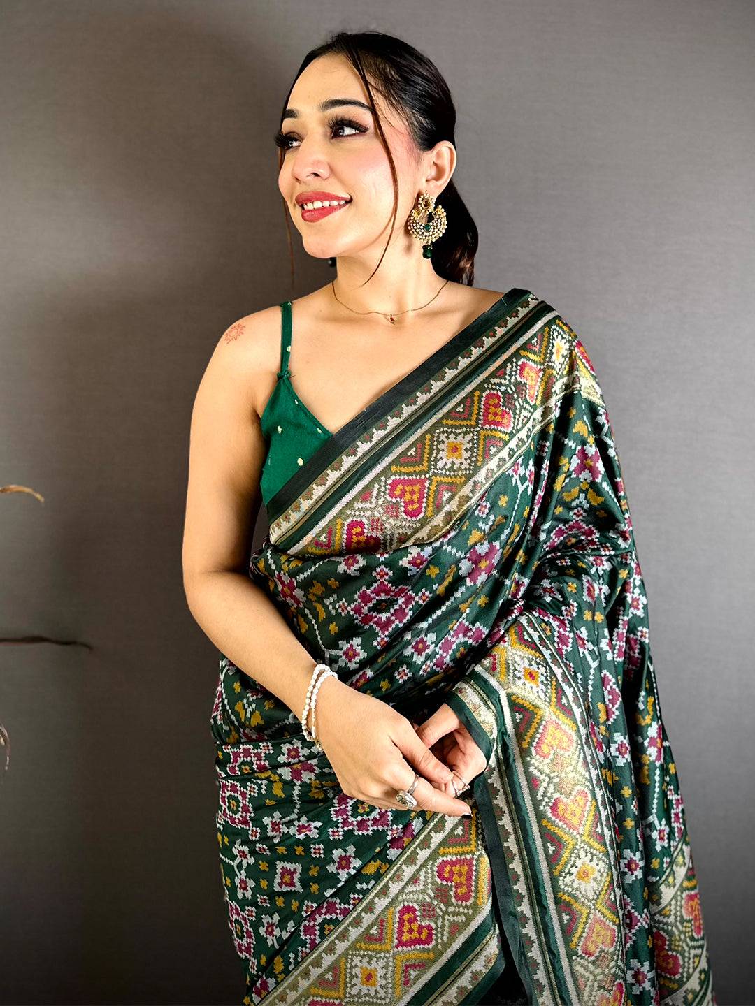 Green Patola Weaving Semi Silk Saree
