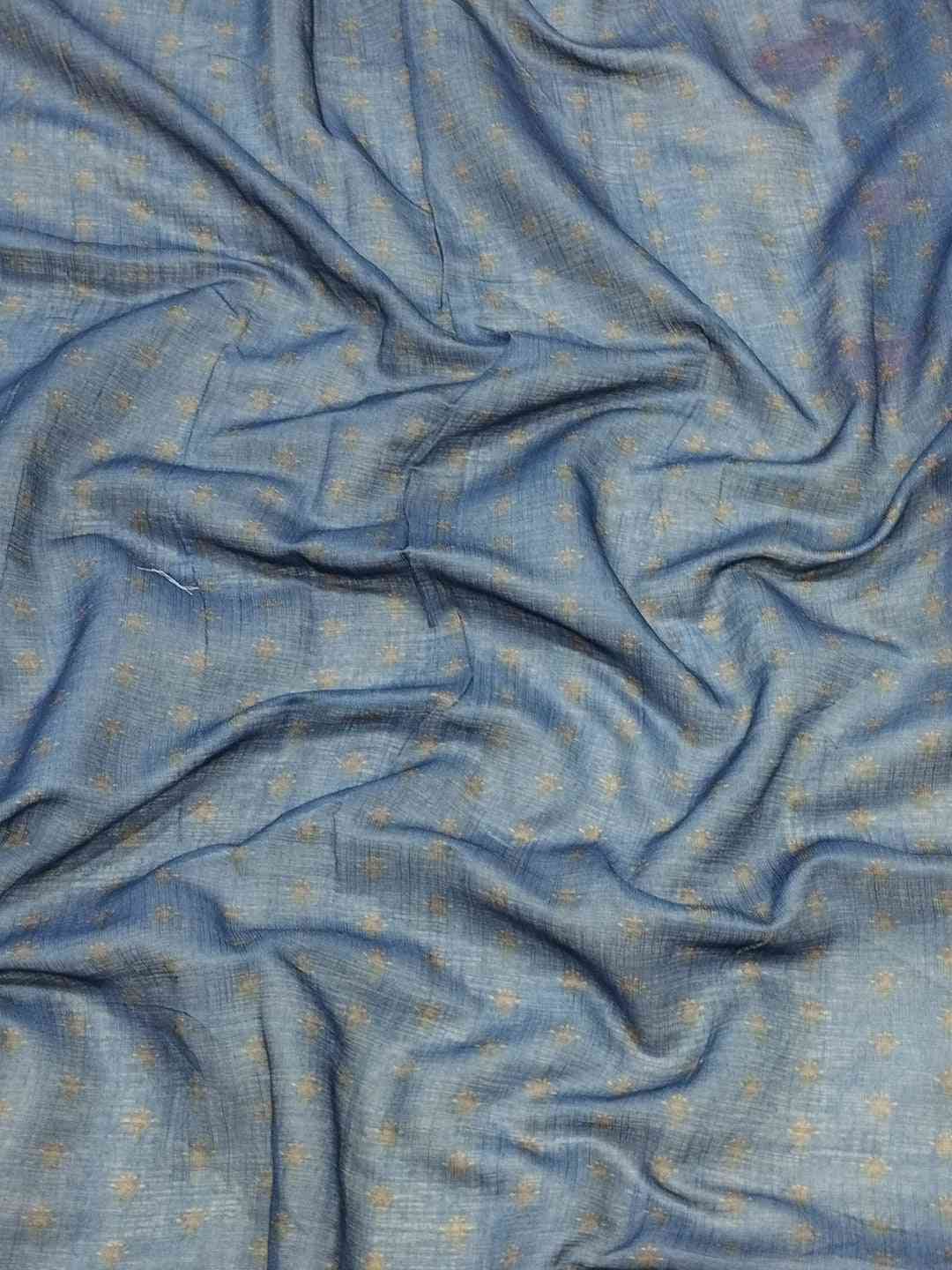 Blue fabric with subtle pattern, close-up view