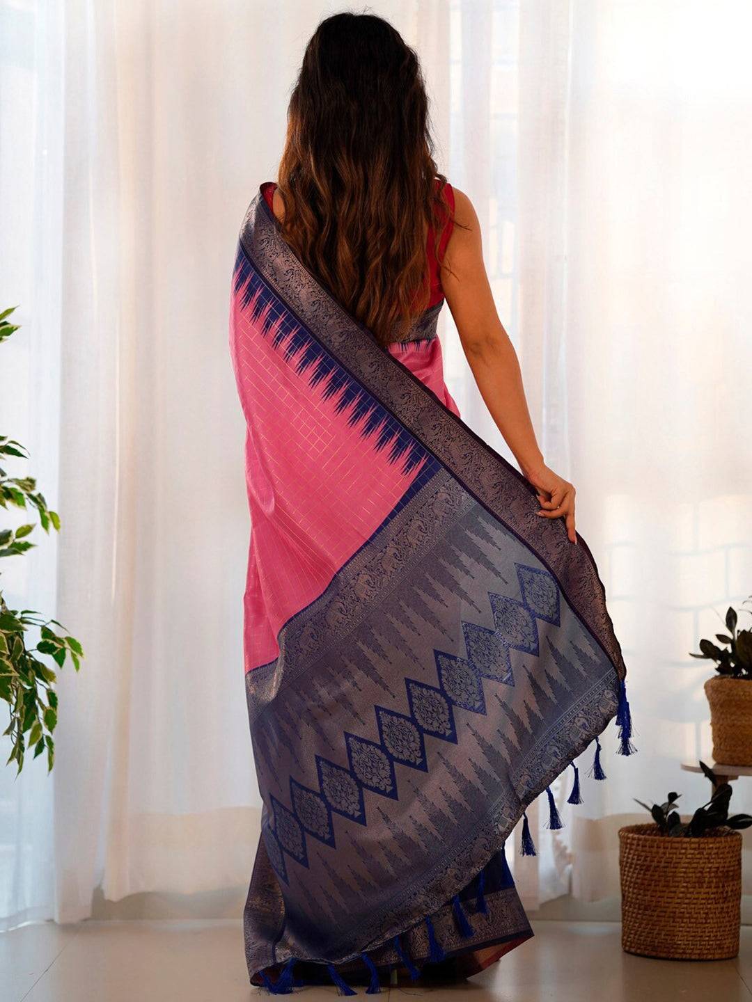 Back view of pink Banarasi Gadwal saree with intricate blue border