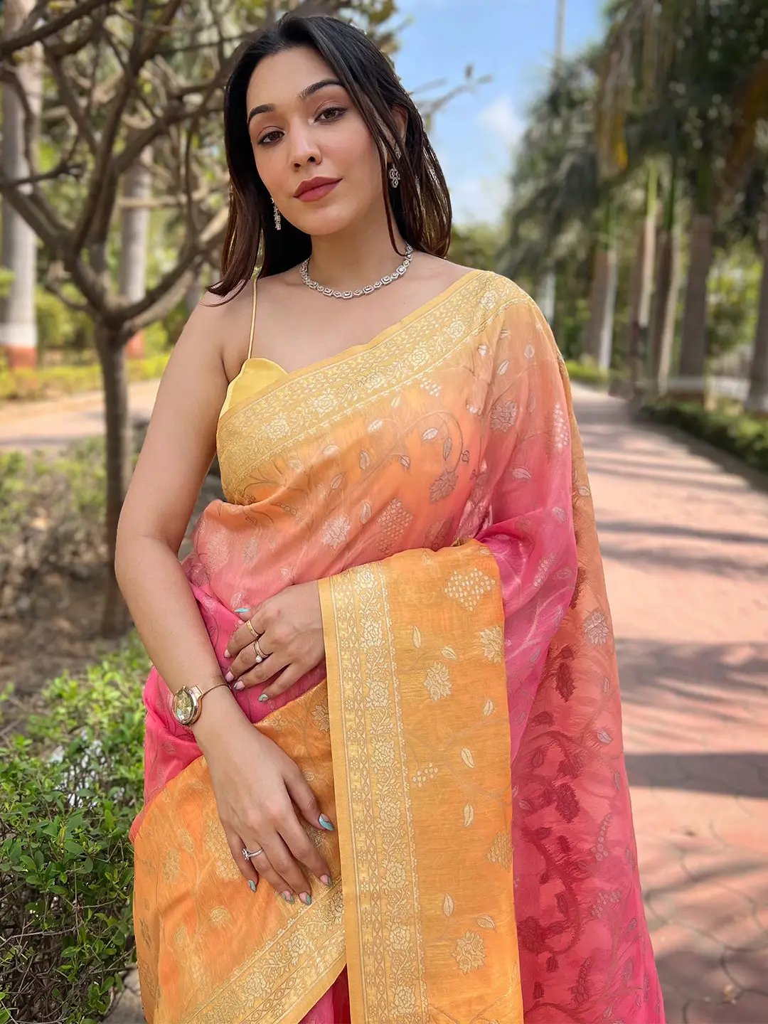 Front view of pink Bollywood slub silk saree with intricate zari work