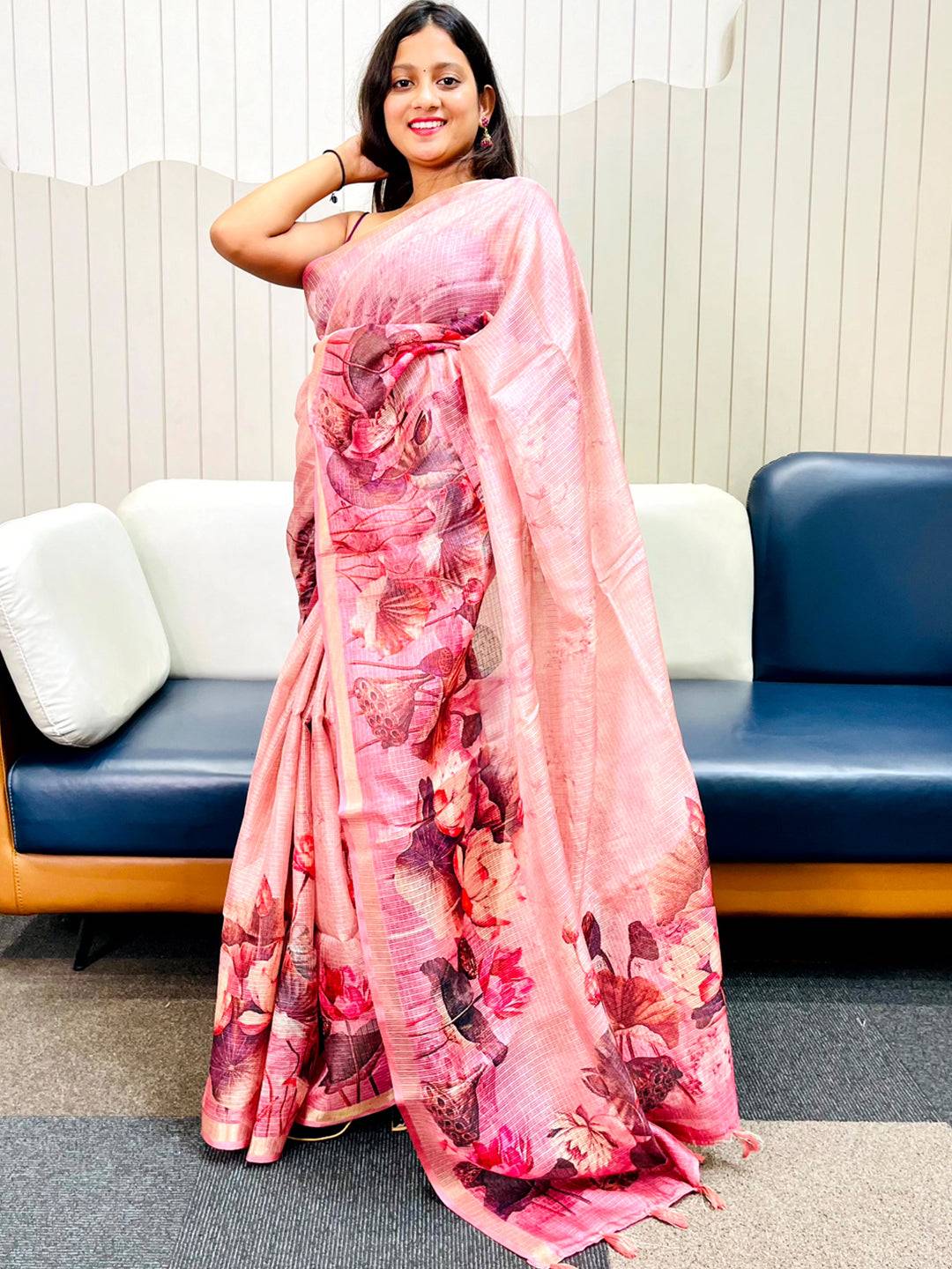 Model posing in pink floral print Kota Doriya silk saree