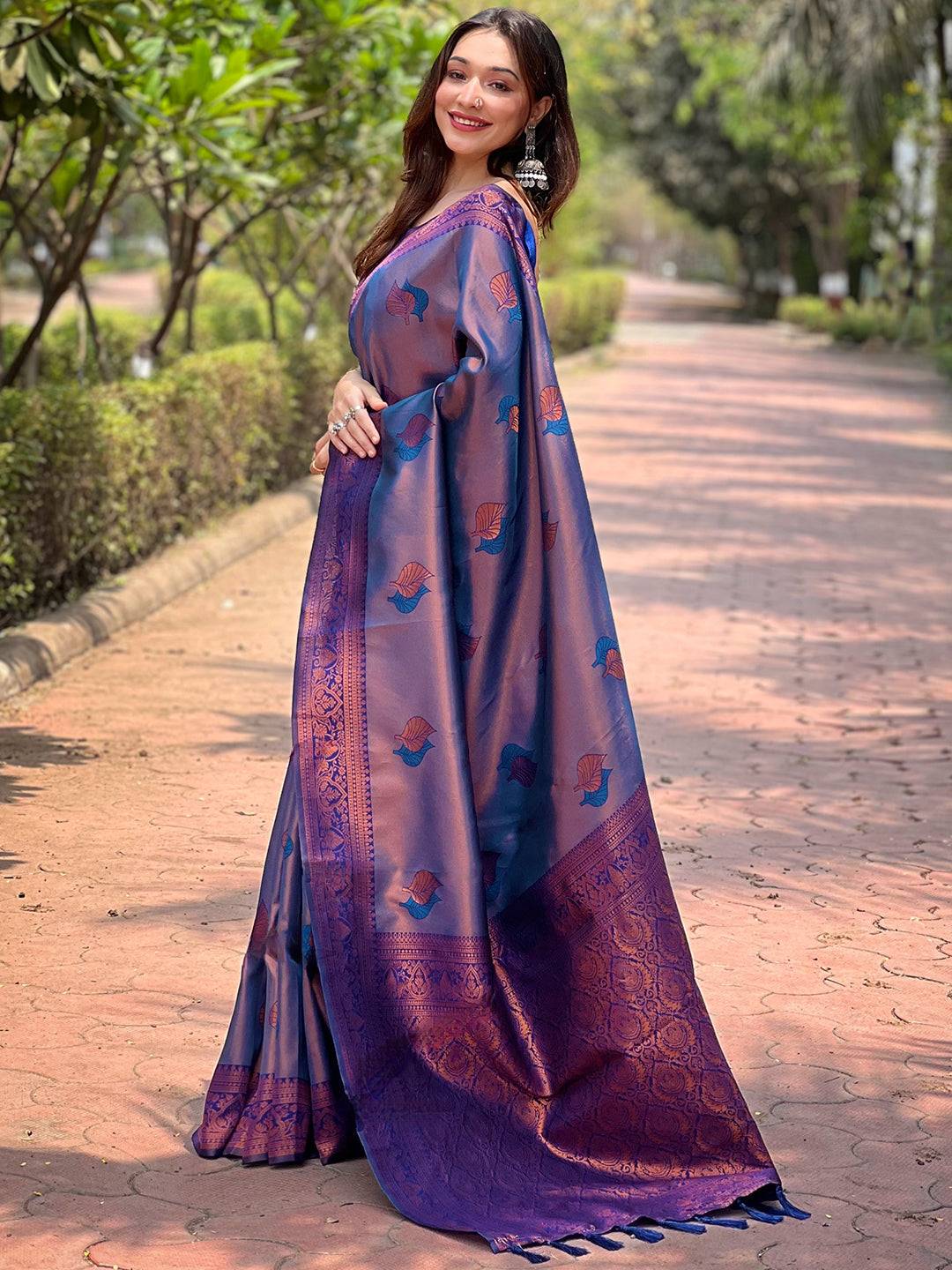 Side view of navy Kanjivaram saree with elegant gold zari