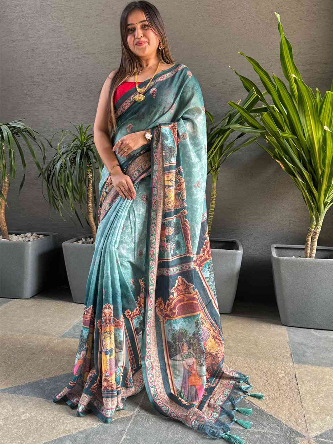 Elegant turquoise saree with intricate digital print design