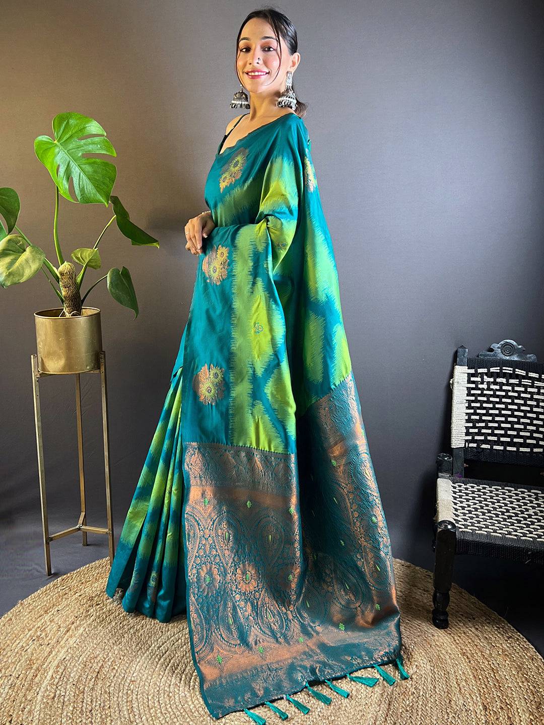 Side view of Parrot Green Tussar Silk Ikkat Weaving Saree.