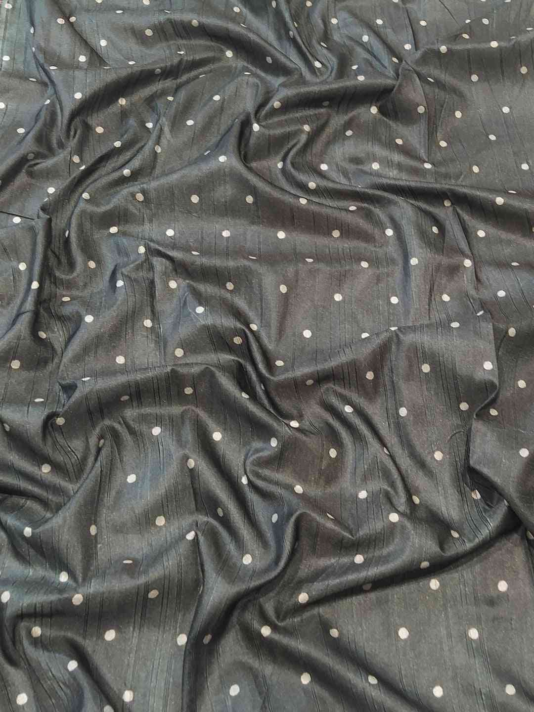 Close-up of Tussar Ghicha Silk fabric with polka dot pattern