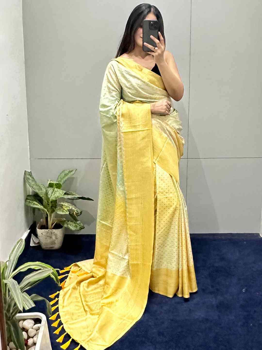 Yellow and green Banarasi Ombre Saree draped elegantly