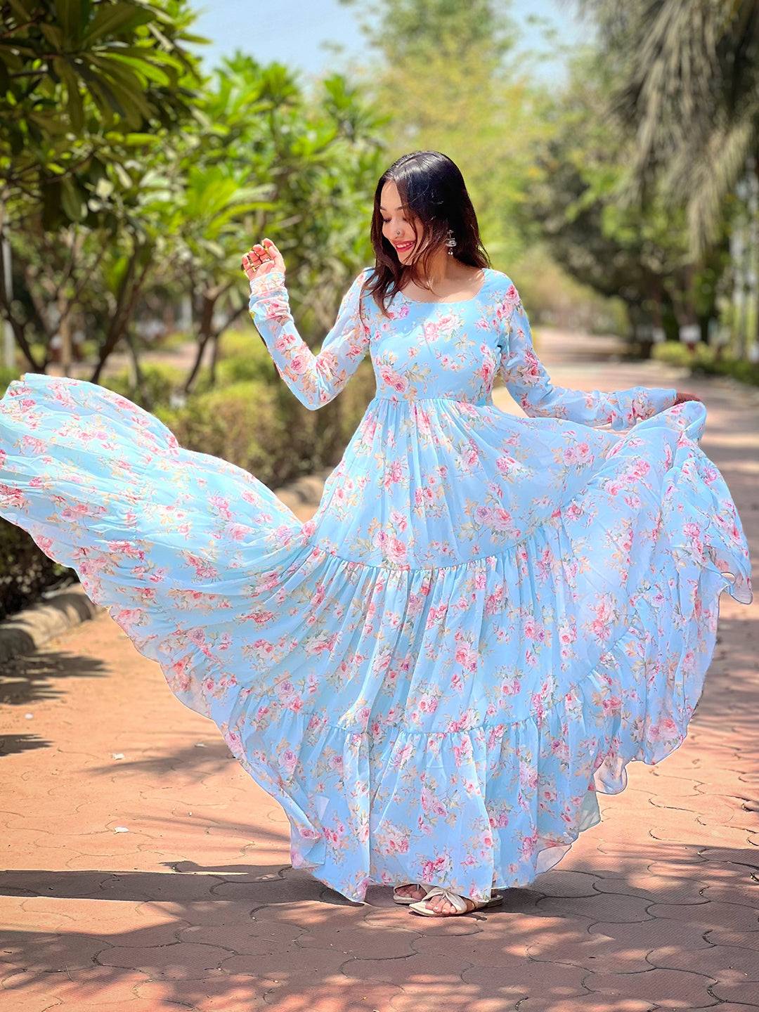 Woman in Sky Beauty Floral Dress posing gracefully