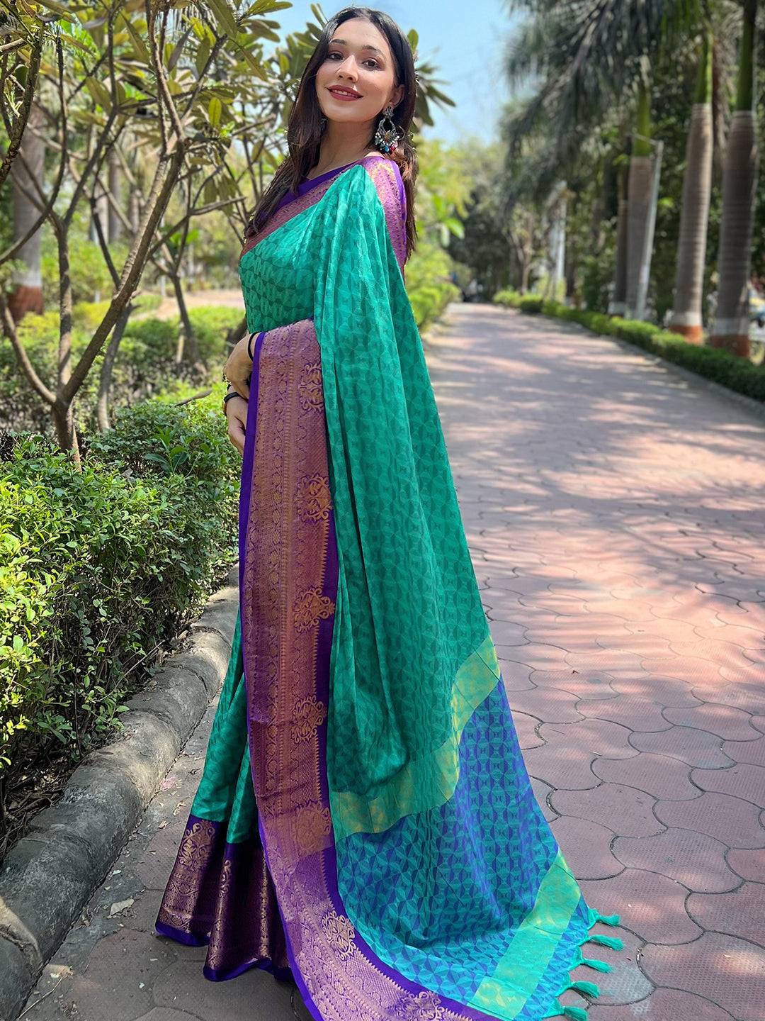 Graceful Kanjivaram saree in vibrant green and purple hues