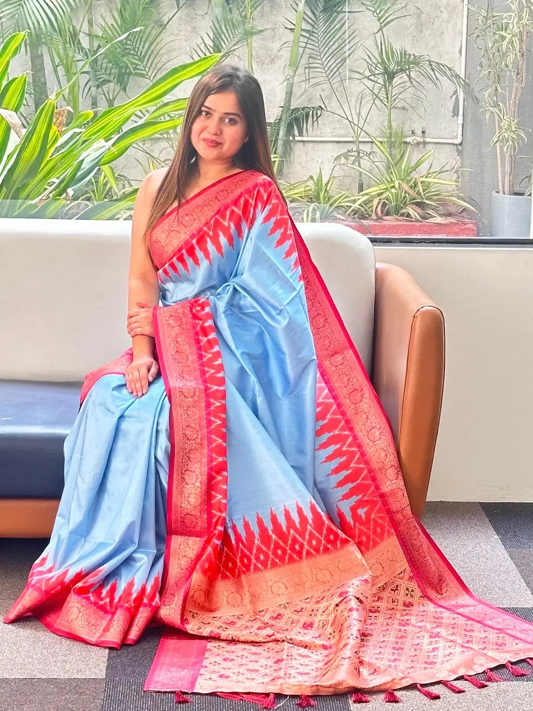 Elegant blue Banarasi silk saree with red jacquard border