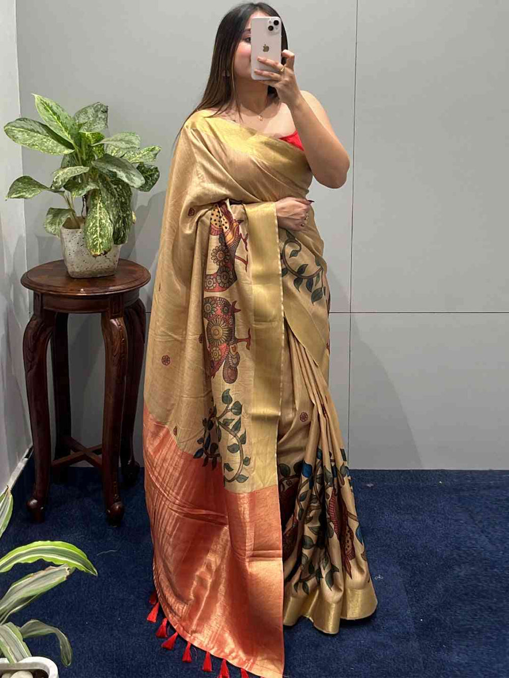 Woman posing in Pen Kalamkari Linen Tissue Soft Saree
