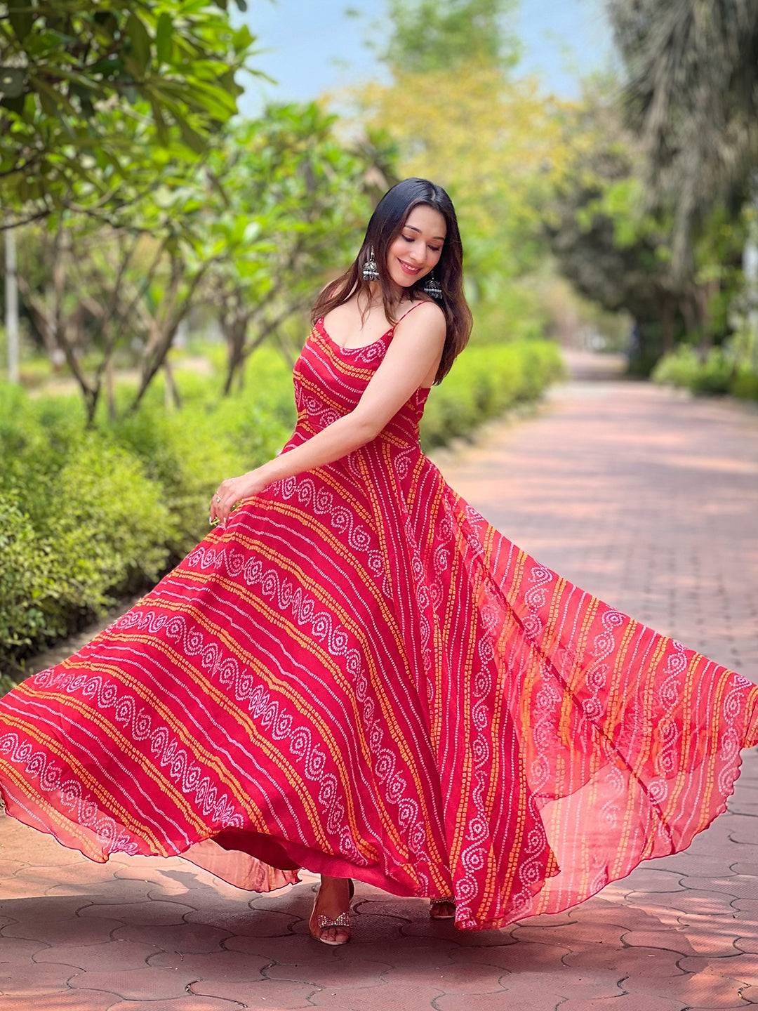 Woman twirling in Rose Red Long Printed Dress