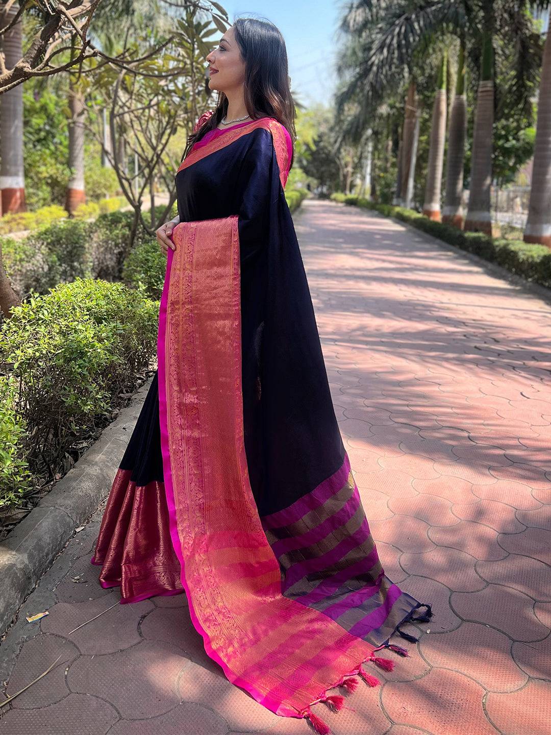 Side view of Navy Kanjivaram Saree with intricate pink border