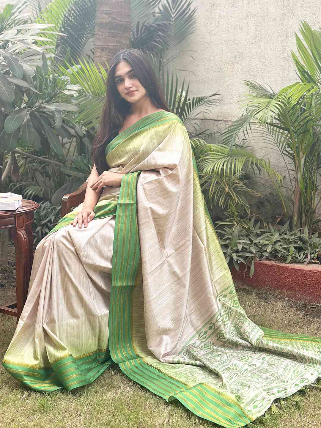 Traditional Ghicha saree featuring green Ikkat and paisley designs