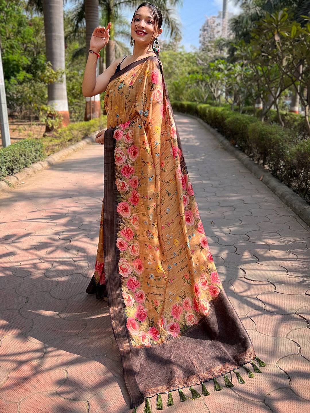 Elegant orange saree with digital floral print and zari border