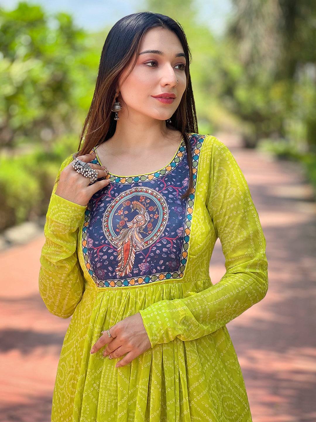 Close-up of Pea Green Bandhej Dress with Kalamkari design