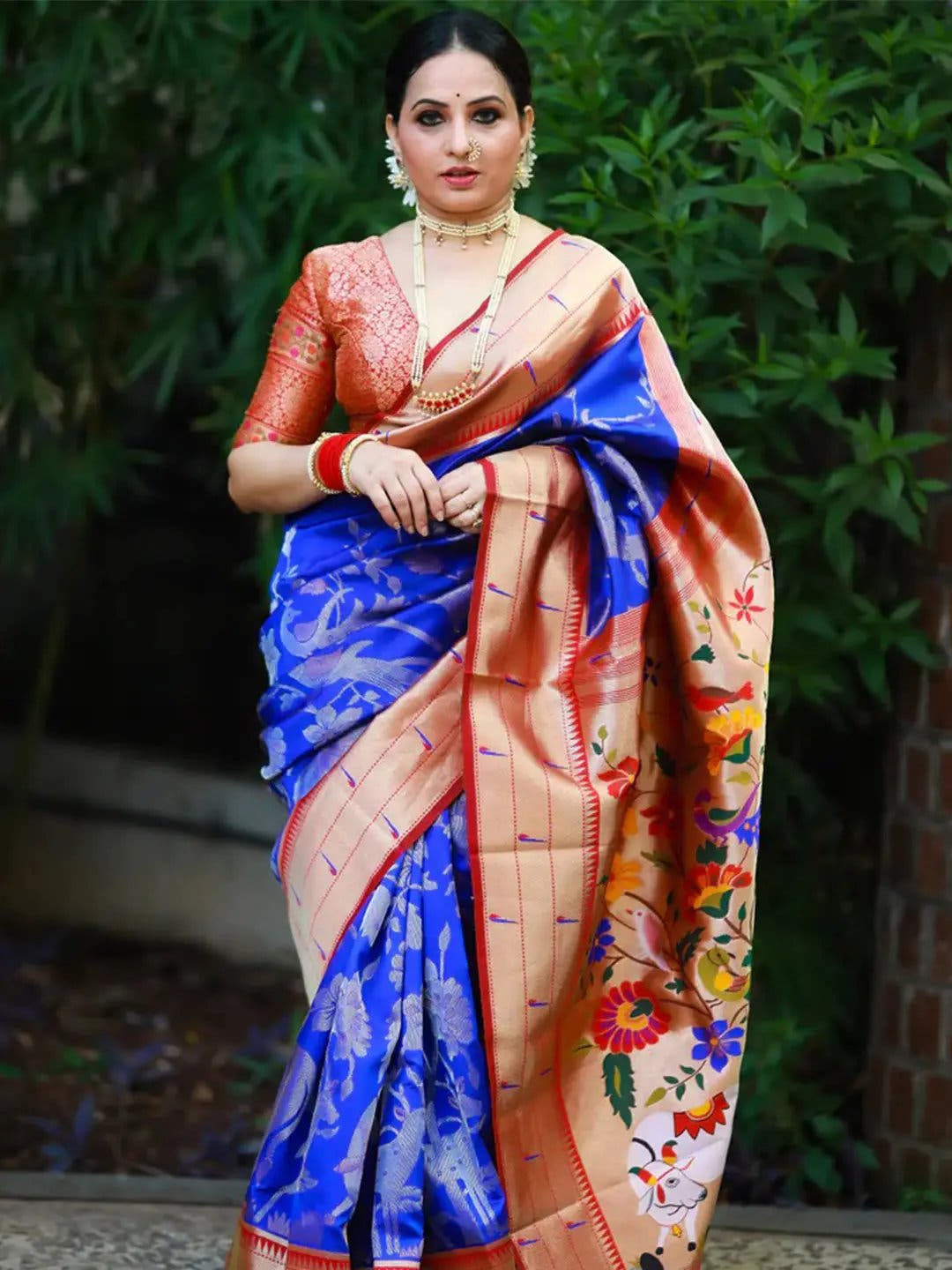 Elegant Paithani silk saree in royal blue with floral pallu