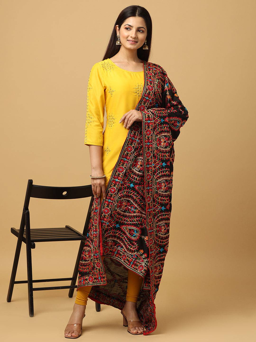 Model showcasing black pashmina dupatta with embroidery