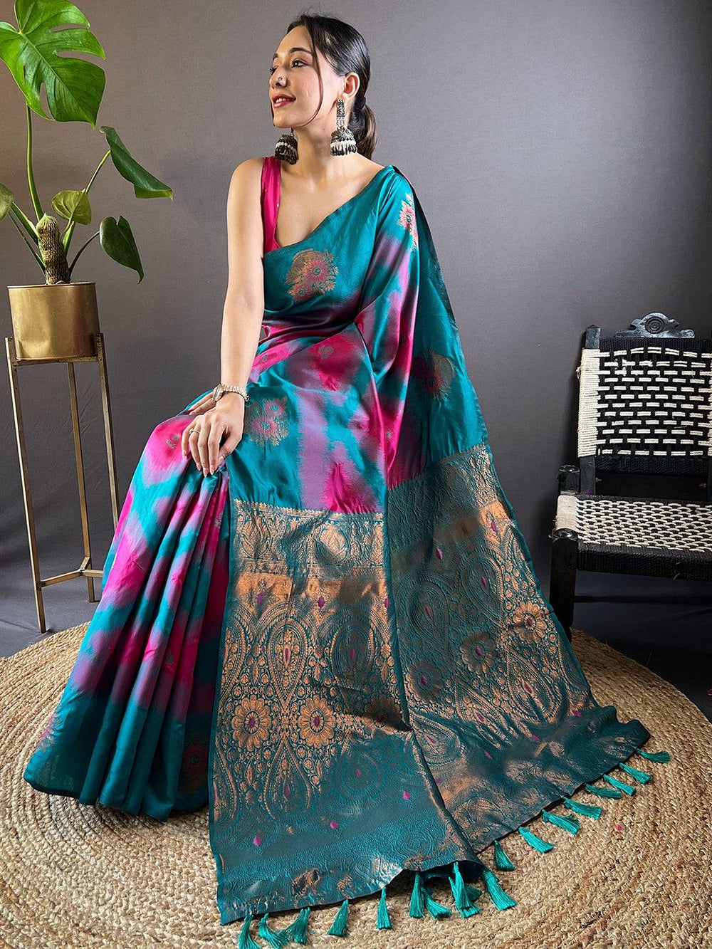 Sitting pose with Rani Tussar Silk Ikkat Weaving Saree.