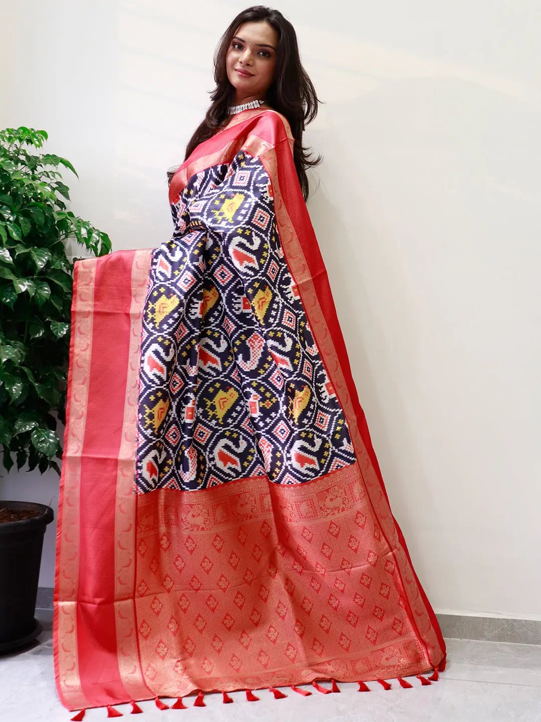 Traditional soft silk saree featuring intricate Pochampally design