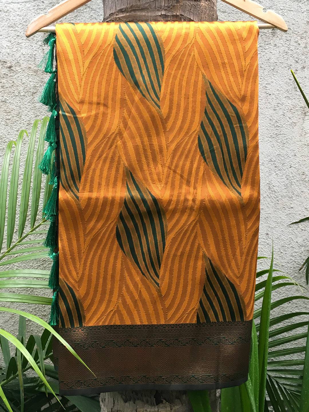 Mustard Tussar Silk Ikkat Saree on Hanger