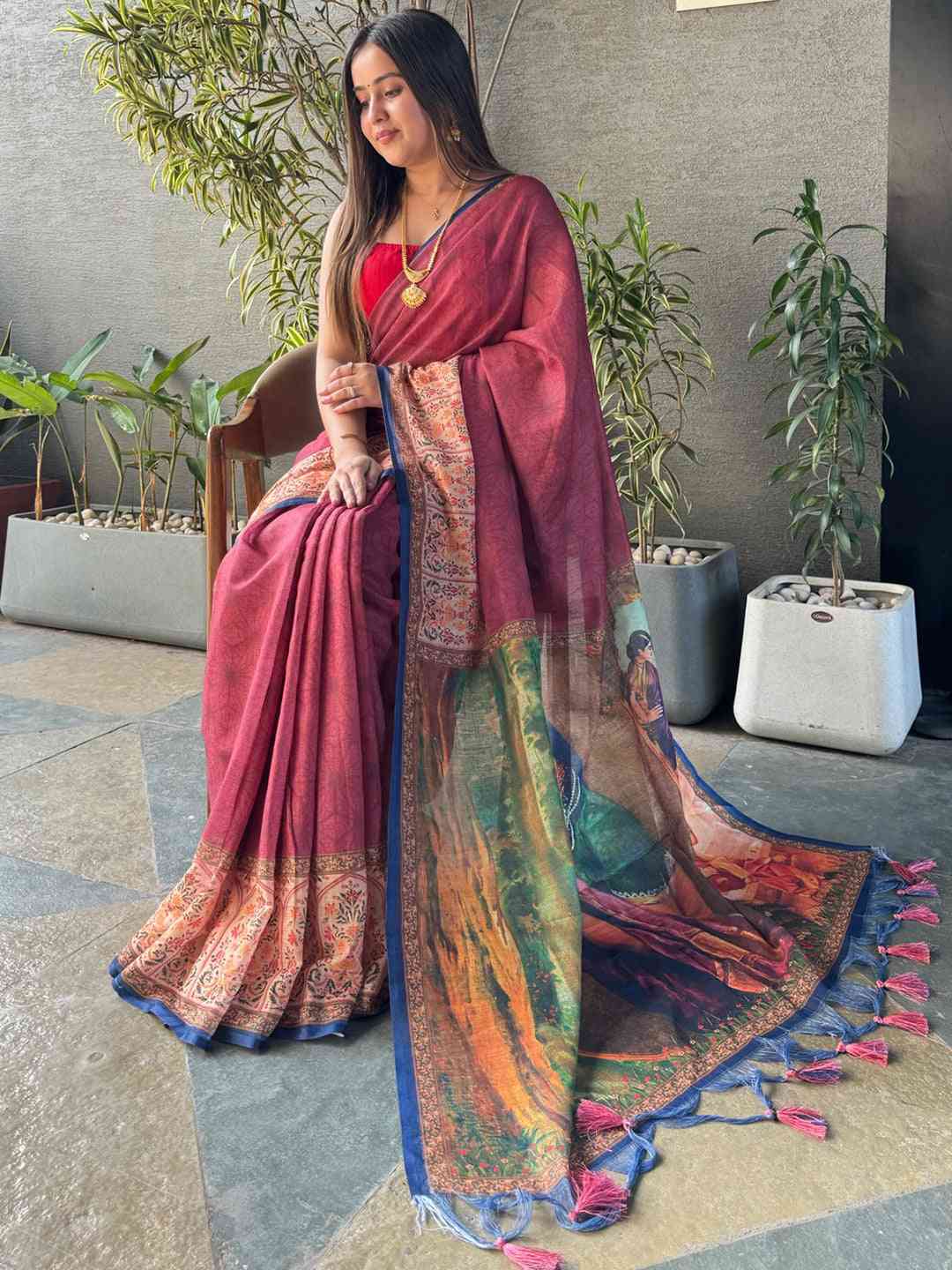 Burgundy Ikkat saree with intricate kalamkari design