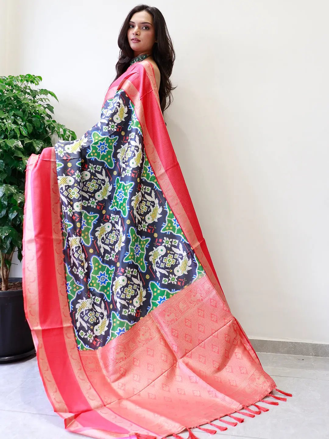 Vibrant Pochampally print saree with striking Gadwal border