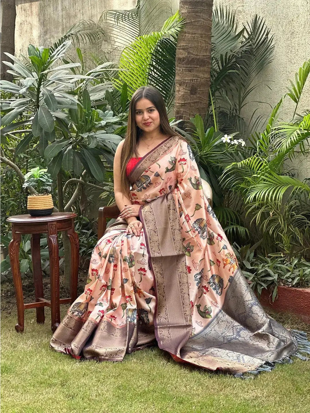Soft Silk Kalamkari Saree with digital print, worn outdoors