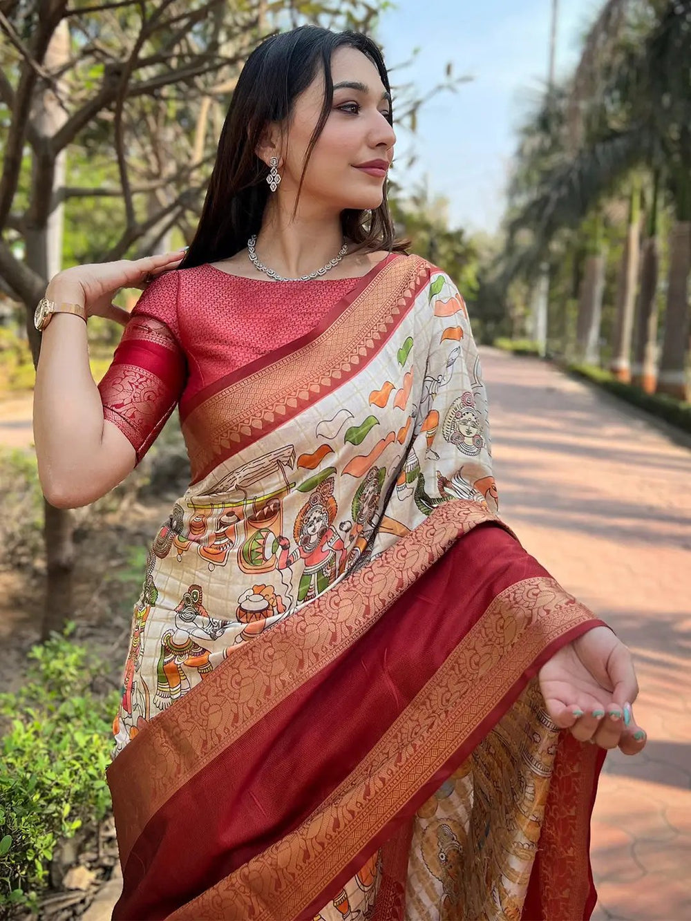 Soft silk Banarasi saree in maroon with vibrant patterns