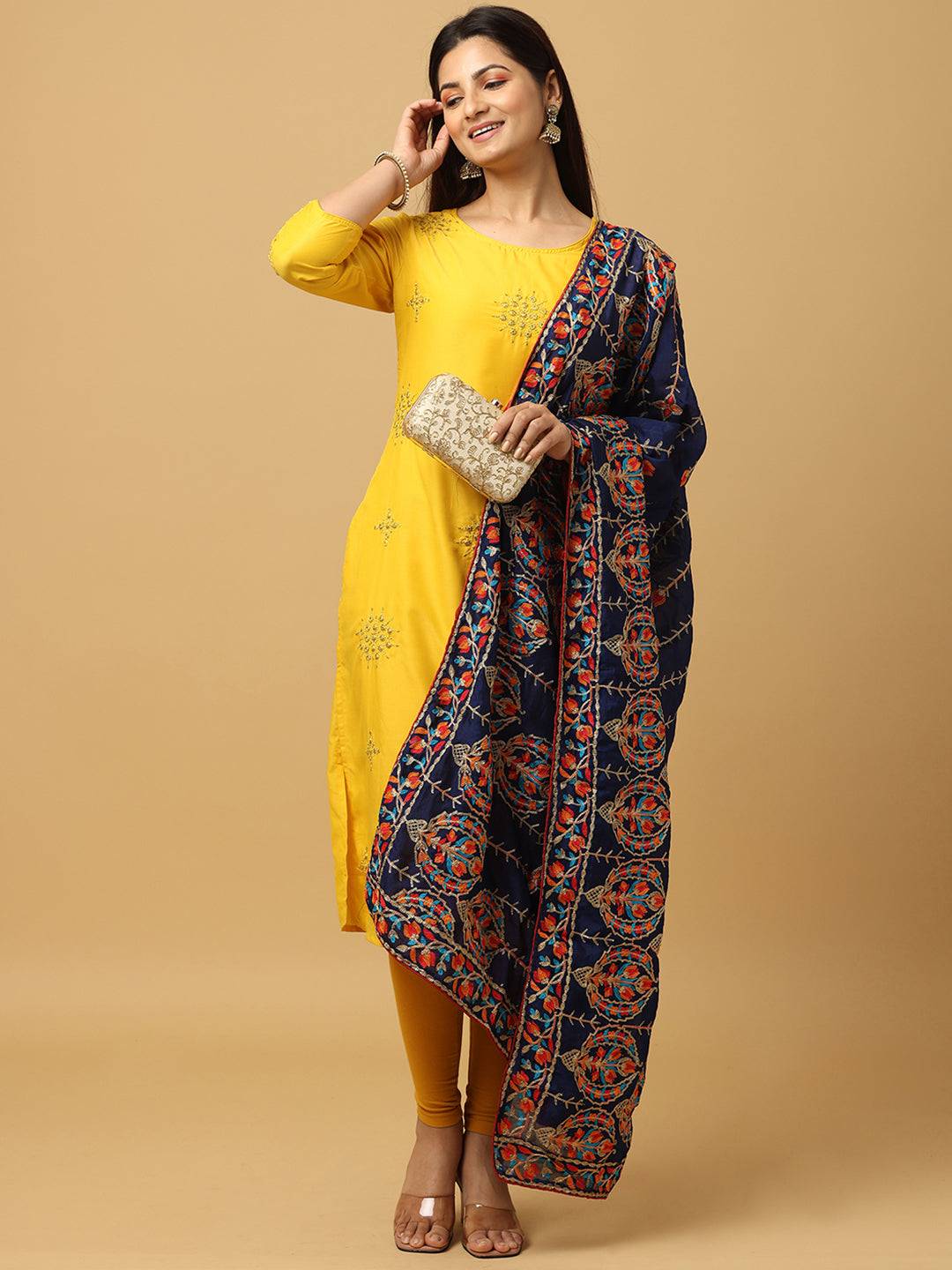 Navy chiffon dupatta with vibrant embroidery, paired with yellow dress.