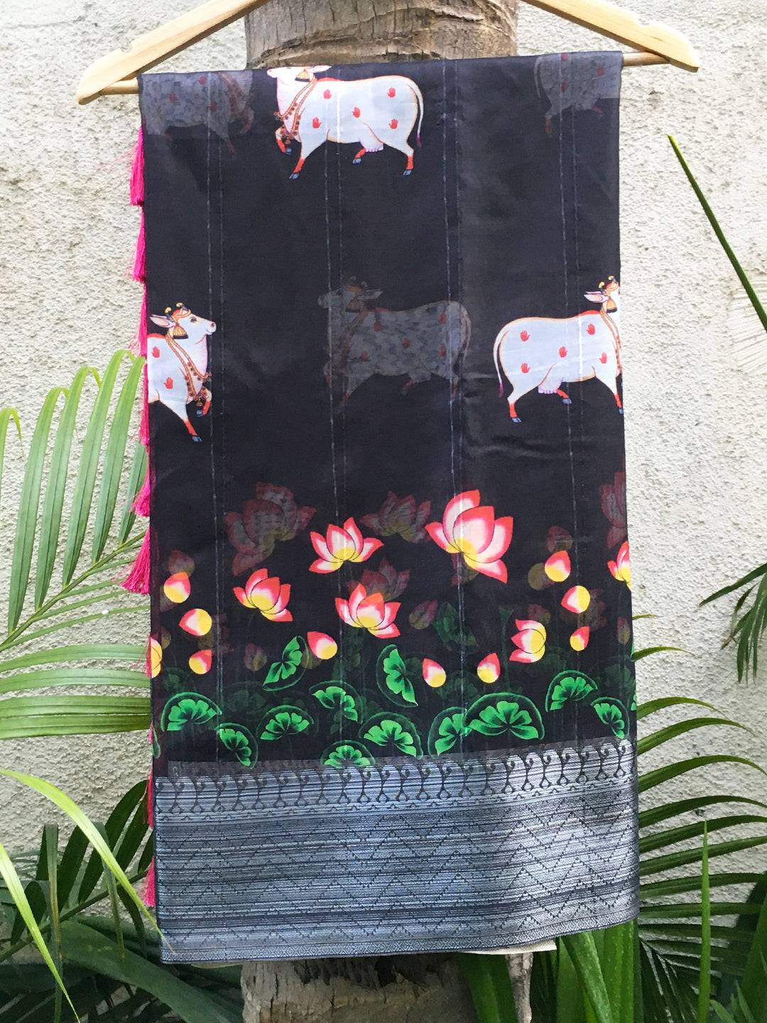 Revan Black Organza Pichwai Print Saree with floral and cow motifs
