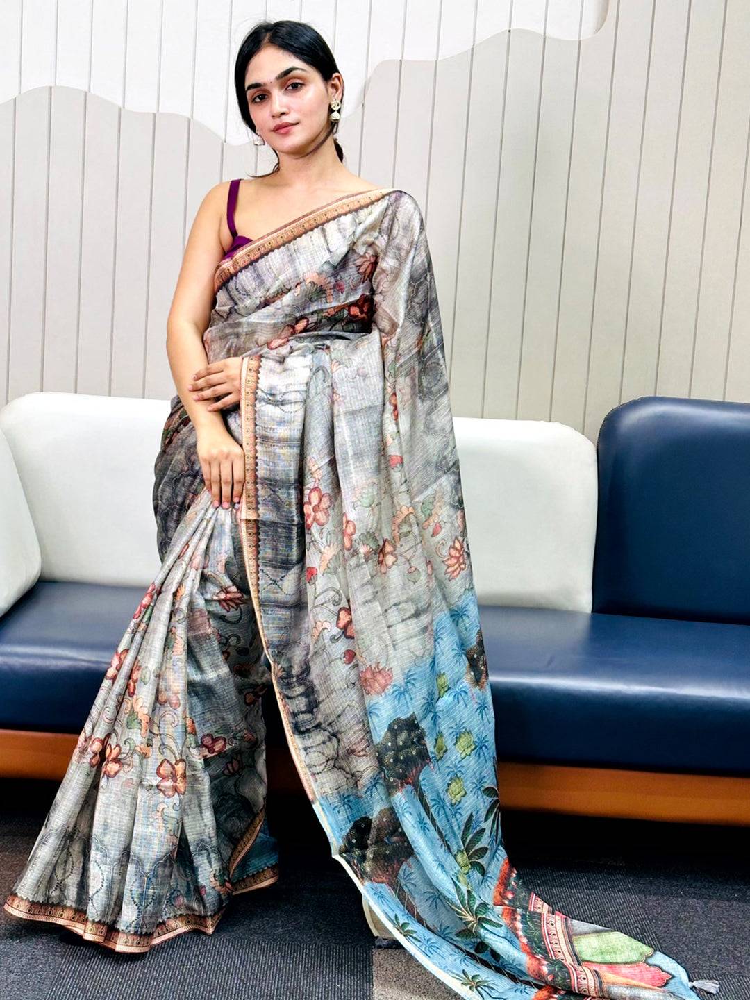 Model showcasing grey Kota Doriya silk saree with floral design