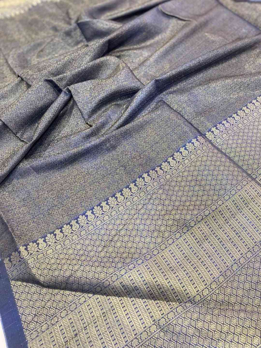 Detailed view of Moonga Silk Kota Doriya saree fabric